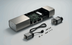An exploded view of a precision electromechanical assembly, showcasing the integration of mechanical drives, PCB components, and custom cabling.