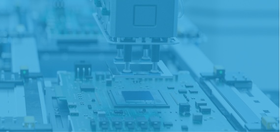 Pick-and-place machine head positioning a chip onto a circuit board, shown in a light blue tint.